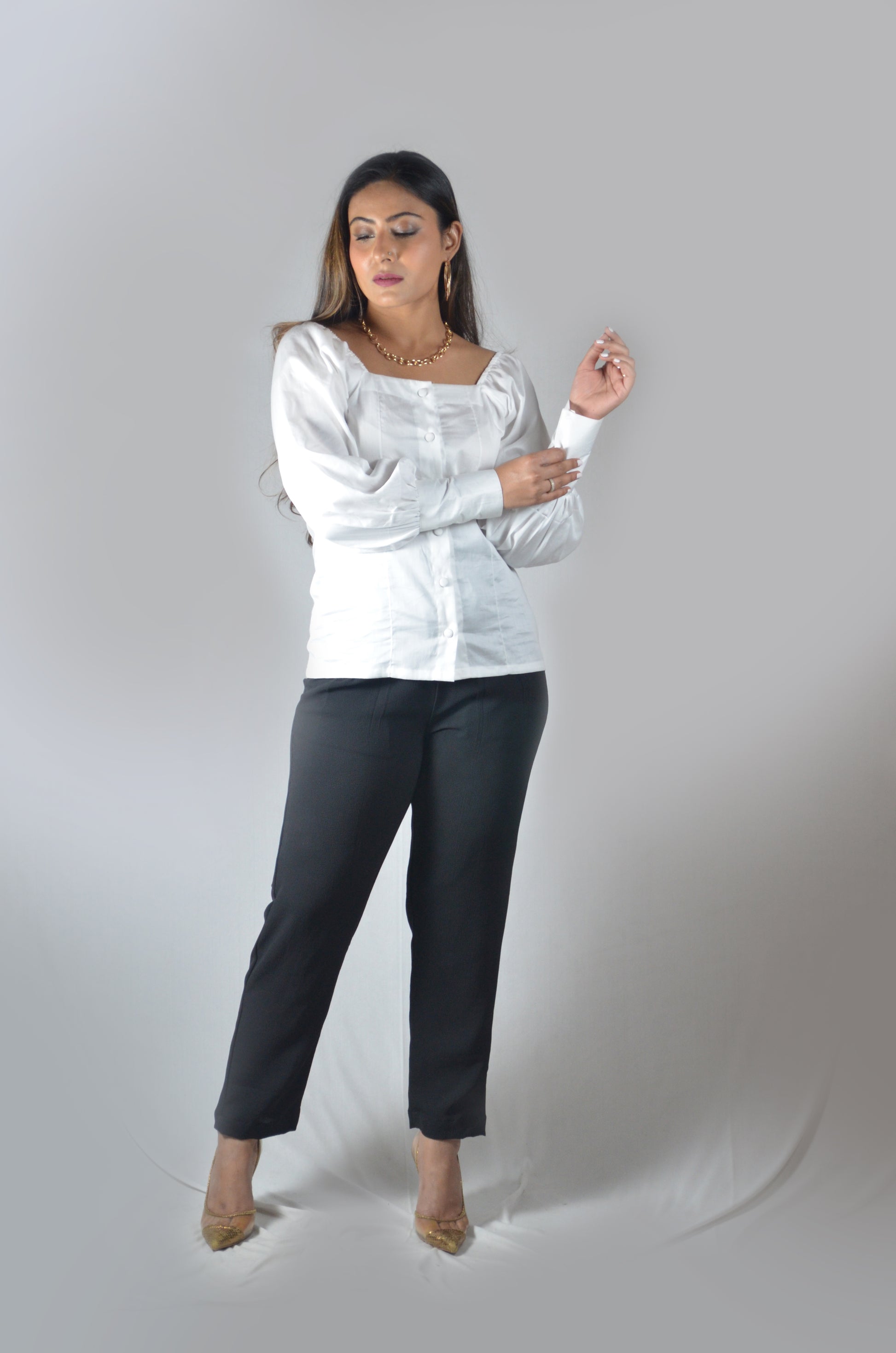 women western wear fashion. Classic white shirt with balloon sleeves. Formal wear, office wear, casual top, party tops