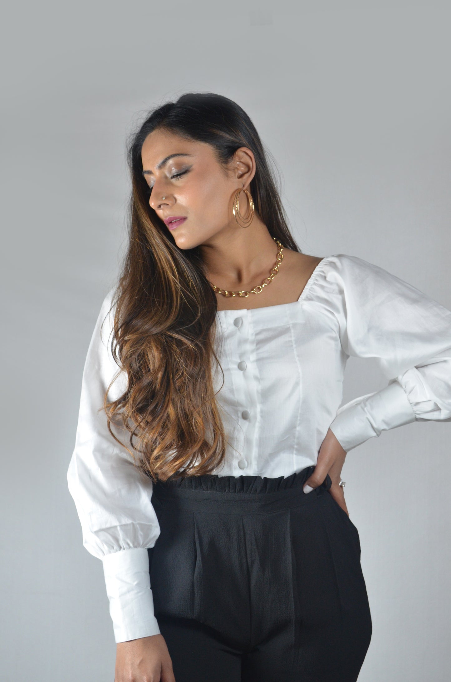 women western wear fashion. Classic white shirt with balloon sleeves. Formal wear, office wear, casual top, party tops